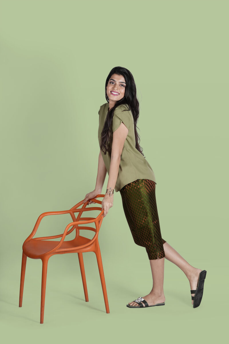 Fashion Model in Olive Top and Capri Pants